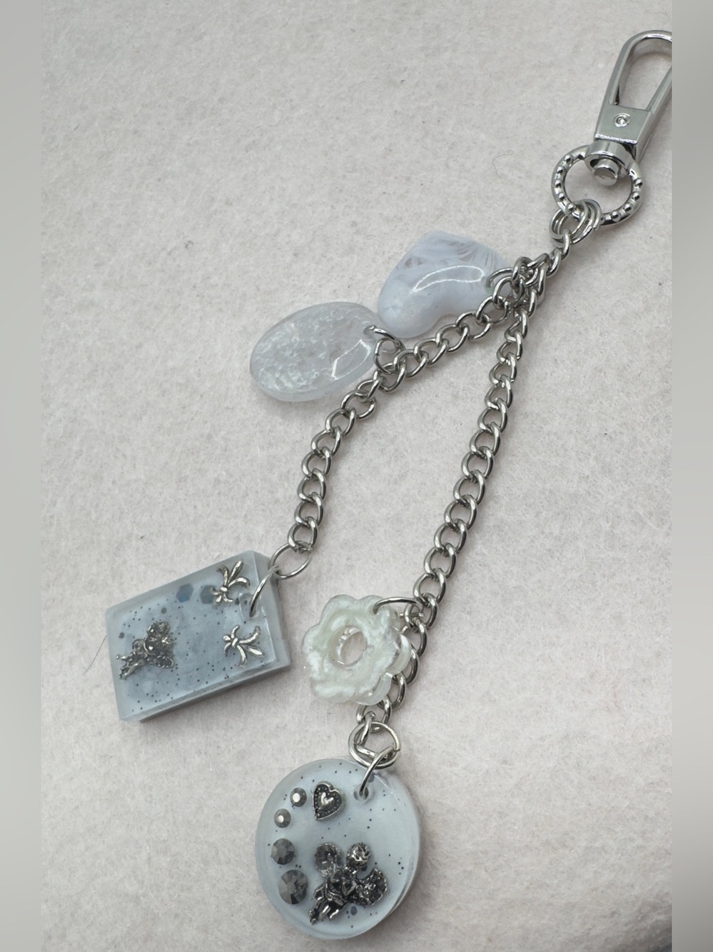 White and Silver-Tone Cherub Angel Bagcharm with Translucent White Accents